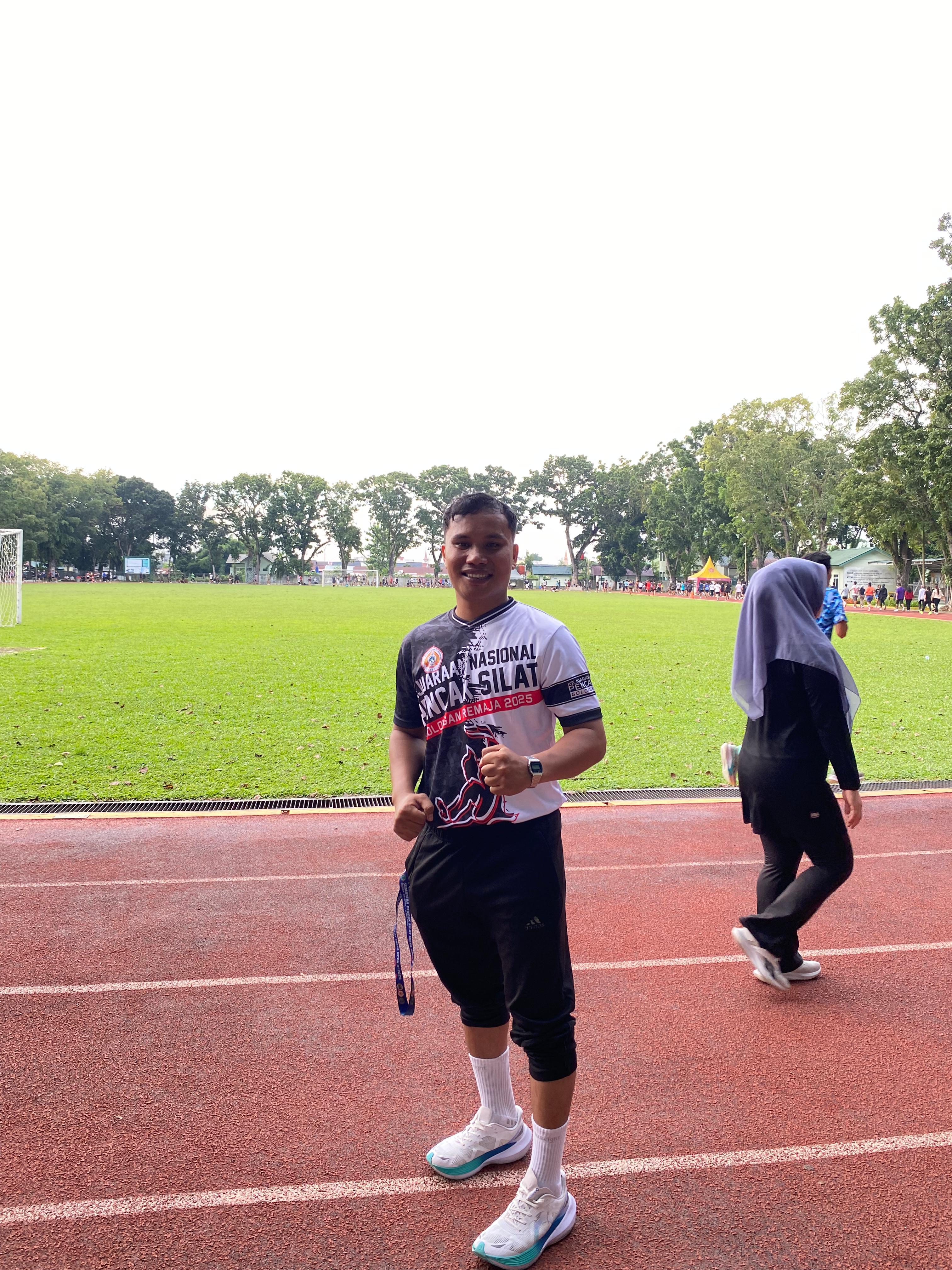 Adek Arifin Harahap, S.Pd